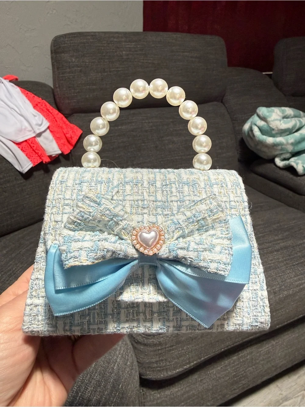 Bundle of girls hair accessories and a small little girls purse.